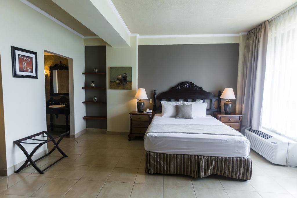 Hotel Altos De Fontana à Managua Chambre photo