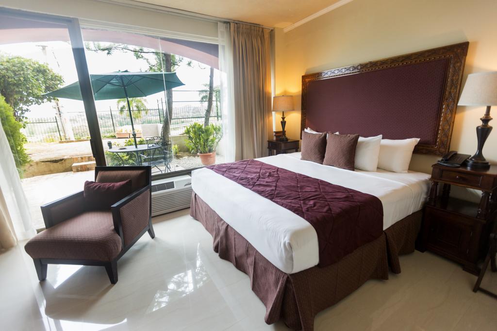 Hotel Altos De Fontana à Managua Chambre photo